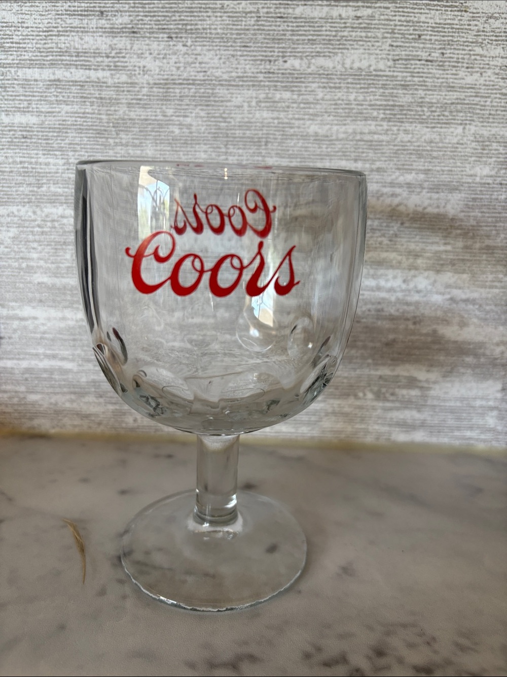 vintage heavy glass Coors schooner goblet featuring a prominent red script logo